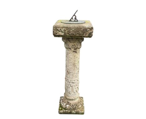 A bronzed metal sundial on a reconstituted stone column. Height 91cm.