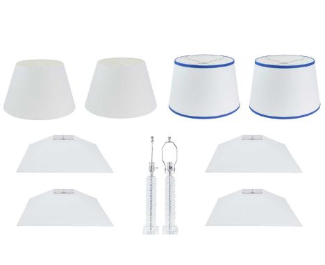 Superyacht furnishings. Eight white lampshades with two perspex lamp bases.  Two white paper lampshades with a blue trim, two