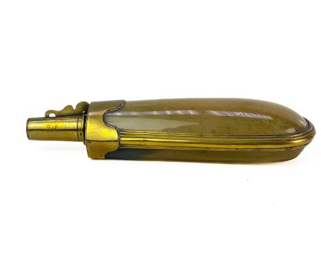 A brass mounted horn powder flask. Circa 1820, with removable tapered cap, length 17cm.