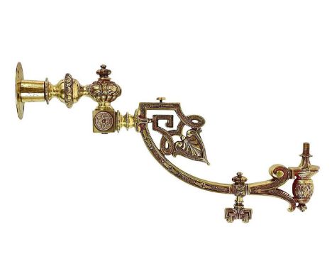 A Victorian ornate cast brass gas lamp bracket. Length 50cm.