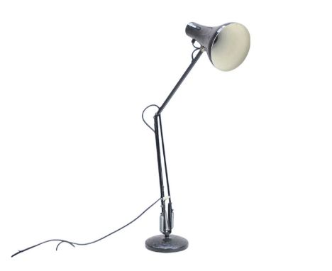 A Herbert Terry anglepoise lamp With black painted finish, on a circular base, height 82cm.