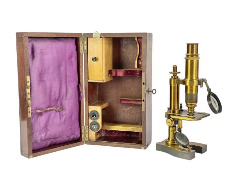 A French lacquered brass microscope by Nachet et Fils, Paris. Circa 1860, inscribed to the lead filled horseshoe shaped base,