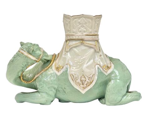 A Royal Worcester porcelain camel modelled by James Hadley. Incised signature and impressed marks, height 17.5cm.This charact