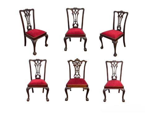 A set of four Edwardian mahogany 'Chippendale' dining chairs, and two similar. With pierced vase splats, drop-in seats, on ca