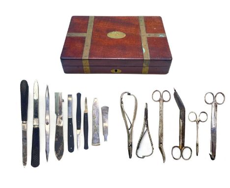 A brass bound mahogany surgeon's box. Early 19th century, containing a few scalpels, knives, and miscellaneous tools, height 