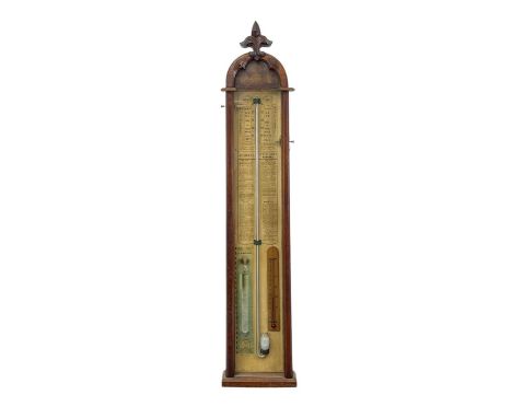 A Victorian oak cased Admiral Fitzroy barometer. With printed card scales and remarks, height 114cm.
