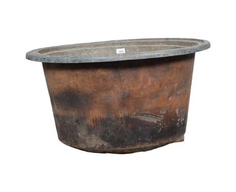 A copper planter, with pierced rounded base. 73x43cm.