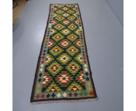 A Chobi Kilim runner, 287 x 83