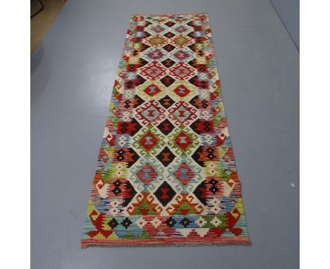 A Chobi Kilim runner, 253 x 84cm