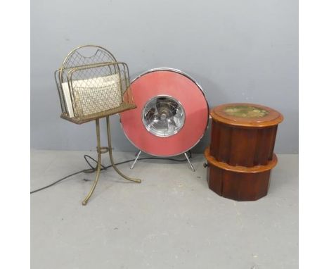 A 19th century brass magazine rack, H86cm. a mid-century fan heater and a commode. (3)