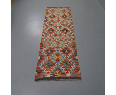 A Chobi Kilim runner, 192 x 60cm