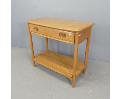 ERCOL - A Windsor two-tier console table. Length 80cm, height 72cm, depth 41cm. Good condition. Some light surface scratches.