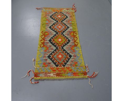 A Chobi Kilim runner, 148 x 62cm