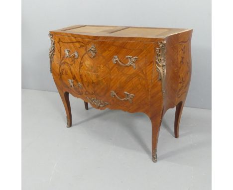 MERCIER FRERES - A late 19th / early 20th century French Kingwood veneered bombe commode chest of two long drawers, with ormo