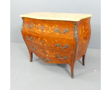 A French Louis XV style kingwood veneered and satinwood strung bombe commode chest of three drawers, with marble top, brass m