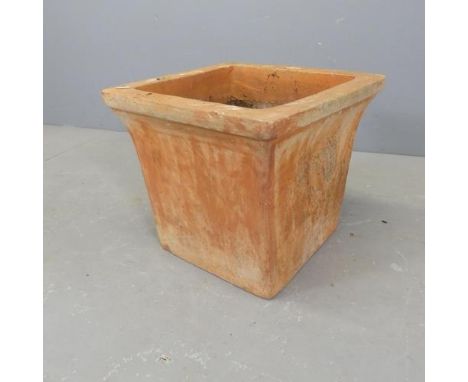 A square terracotta garden planter, with shell design handles. W37cm, H32cm.