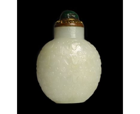 A good Chinese archaistic white jade snuff bottle, 1780-1850, of flattened flask form, well hollowed and finely carved in rel