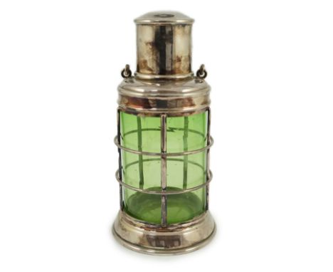 An Asprey &amp; Co. silver plated and green glass novelty cocktail shaker in the form of a lantern, with wood handle, interna