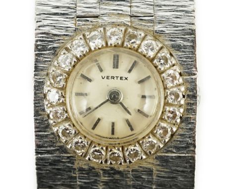 A lady's 1960's 18ct white gold and diamond set Vertex manual wind bracelet watch, with baton numerals and diamond set bezel,