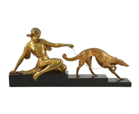 Armand Godard (1824-1887). A French Art Deco bronze group of a seated maiden with a borzoi upon a leash, on stepped black mar