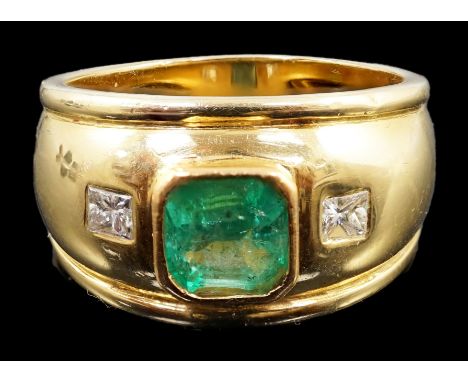 A modern Theo Fennel style 18ct gold, single stone collet set emerald and two stone gypsy set princess cut diamond dress ring