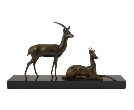 Georgij Dmitrievic Lavroff (Russian, 1895-1991). An Art Deco bronze group of two antelope, on black marble plinth, signed in 