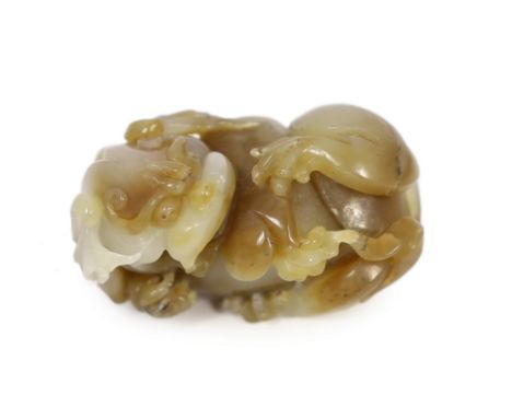 A Chinese white and brown jade lion-dog carving, carved in the round with openwork head and limbs, 5.4cm long***CONDITION REP