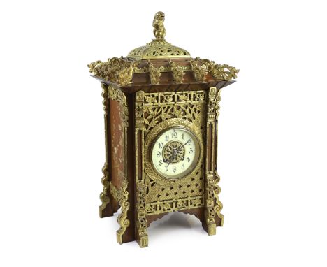 A late 19th century French ormolu mounted mahogany and shibayama style mantel clock, in the Japanese taste, modelled as a pag