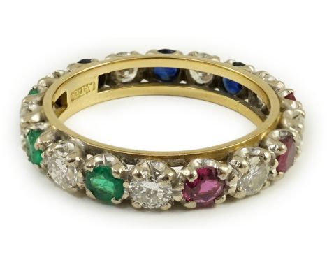 A modern 18ct gold, ruby, sapphire, emerald and diamond set full eternity ring, size O/P, gross weight 4.3 grams.***CONDITION