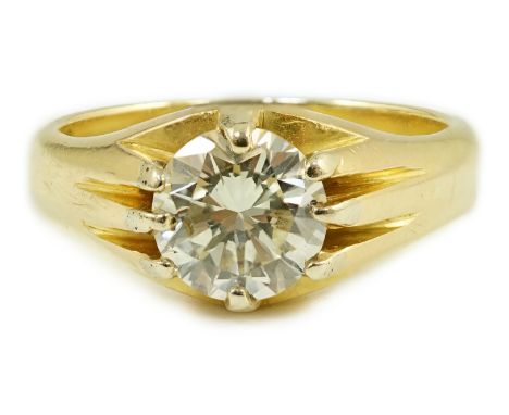 A modern 18ct gold and claw set solitaire diamond ring, the round brilliant cut stone weighing 1.33ct, with an estimated colo