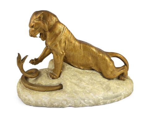 Robert Bousquet (French 1894-1817). An Art Deco bronze and marble group of a tiger fighting a serpent, on naturalistic oval b