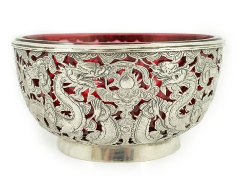 A late 19th/early 20th century Chinese Export pierced silver bowl, by Wang Hing, Hong Kong, with ruby glass liner, decorated 