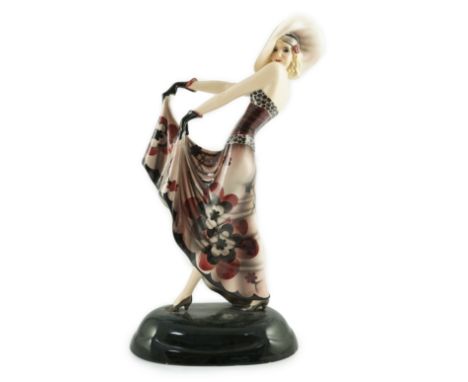 Stefan Dakon for Goldscheider, an Art Deco pottery figure ‘Blonde Dream’ (Lillian Harvey), c.1933, wearing a maroon, black an