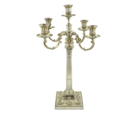 A good Victorian silver four branch, five light candelabrum, by R &amp; S Garrard &amp; Co, with Corinthian column stems, on 