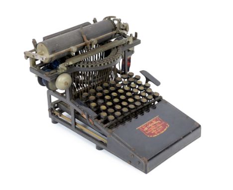 An early typewriter, The Caligraph No.1 manufactured by The American Writing Machine Co. of New York, with original decal to 