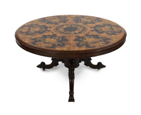 A Victorian and later marquetry inlaid walnut and rosewood breakfast table, with circular tilt top, on fluted stem and scroll