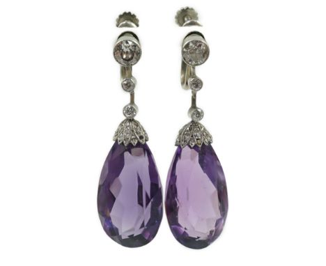 A pair of 1920's platinum?, single stone pear cut amethyst and millegrain round cut diamond set drop ear clips, with diamond 