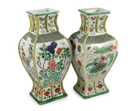 A pair of Chinese famille verte vases, fanghu, Kangxi period, the archaistic rectangular baluster shaped bodies painted with 