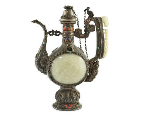 A Tibetan silver, jade, coral and hardstone mounted ewer, late 19th century, the Chinese pale celadon jades, 18th/19th centur