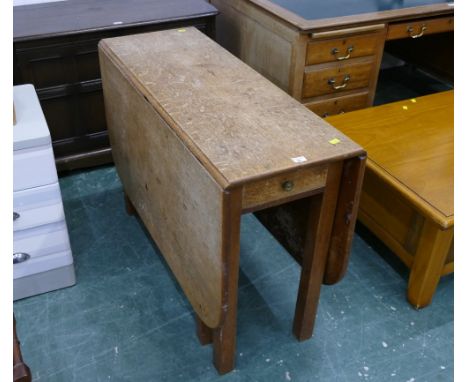 Scrubbed oak twin drop flap gate leg table 