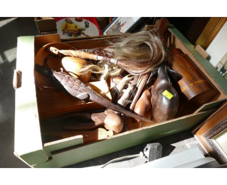 Box of wooden ornaments, trinket boxes, carved elephants and rhinoceroses, bellows etc 