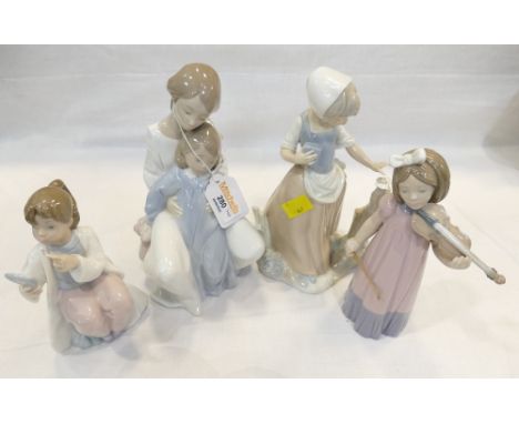 Four Nao figurines 