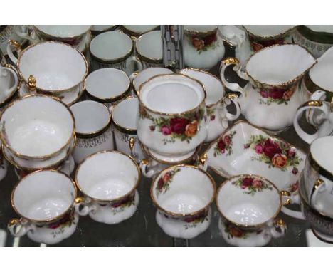 OLD COUNTRY ROSES TEA SET ALONG WITH A GREEN AND GILT ROYAL GRAFTON TEA SET