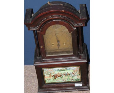 THE OLD BERKSHIRE HUNT FOXHOUND CLOCK
with engraved brass dial with Roman numeral dial, above a plaque depicting a hunting sc