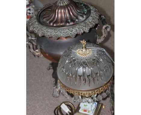TWO SAMOVARS
one a large copper samovar and a smaller silver plated example; together with a ceramic and crystal table lamp; 