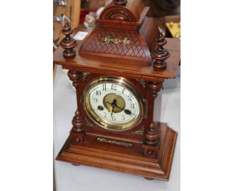 20TH CENTURY REPRO MANTEL CLOCK
including key and pendulum