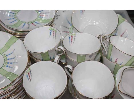 HAND-PAINTED ROSLYN BONE CHINE TEA SERVICE
with hand-painted floral and bird house decorations