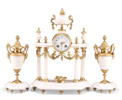 A 19TH CENTURY FRENCH GILT-METAL MOUNTED WHITE MARBLE CLOCK GARNITURE, the portico clock with Arabic numerals to the white en