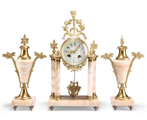 A LATE 19TH CENTURY FRENCH GILT-BRASS AND ONYX CLOCK GARNITURE, the portico clock with foliate finials and columnar base, two