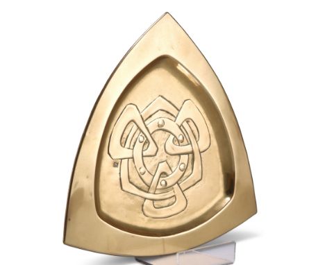 MARGARET GILMOUR (1863-1942), GLASGOW SCHOOL, AN ARTS AND CRAFTS BRASS TRAY,&nbsp;of swollen triangular form, the well having